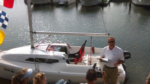 Mike Trovato with Sail Cape Cod speaks during the dedication ceremony of the new adaptive sailboat in Hyannis.