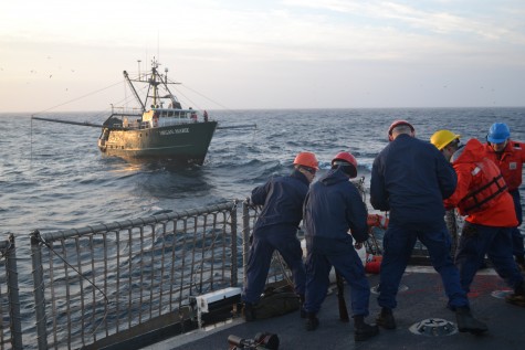 The crew of the Coast Guard Cutter Harriet Lane tows a disabled fishing vessel, Tuesday, March 1, 2016. Harriet Lane is a 270-foot medium endurance cutter homeported in Portsmouth, Va. (U.S. Coast Guard courtesy photo)